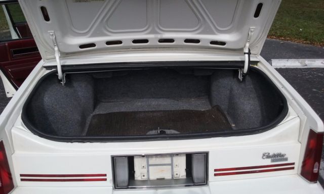 1988 White Cadillac DeVille Sedan