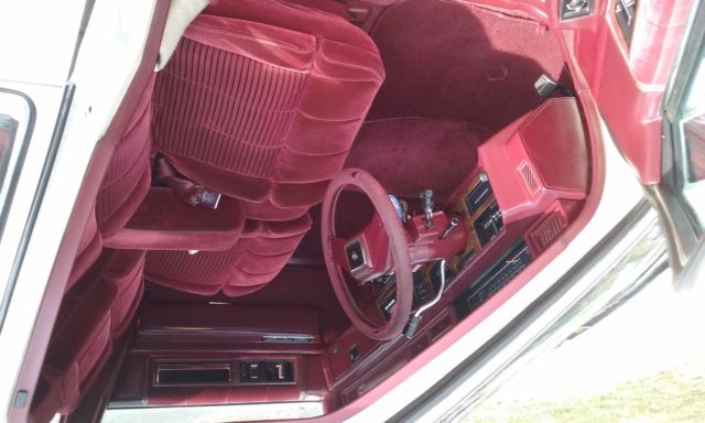 1988 White Cadillac DeVille Sedan