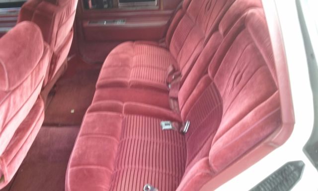 1988 White Cadillac DeVille Sedan