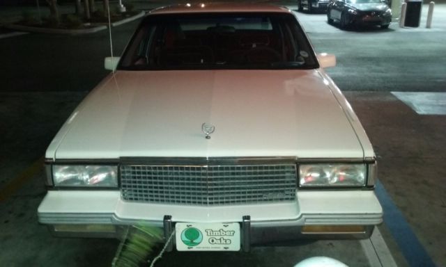 1988 White Cadillac DeVille Sedan