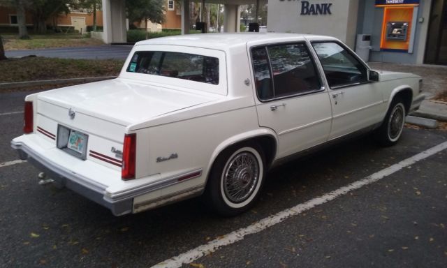 1988 White Cadillac DeVille Sedan