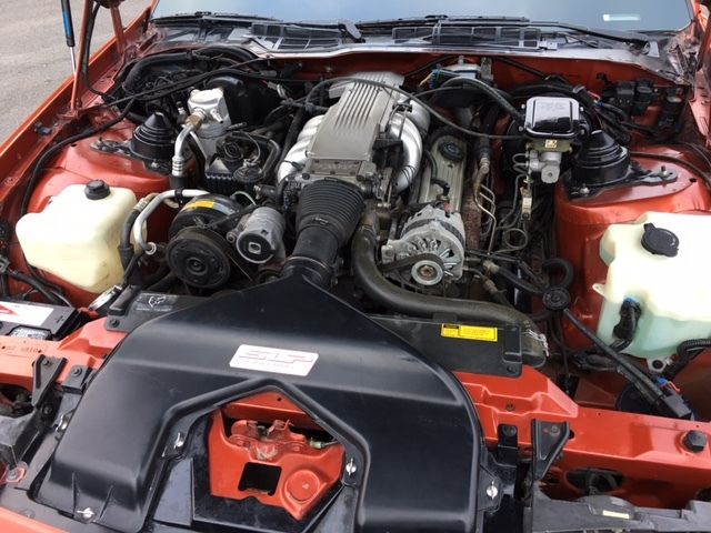1988 Medium Orange Metallic  Chevrolet Camaro Convertible
