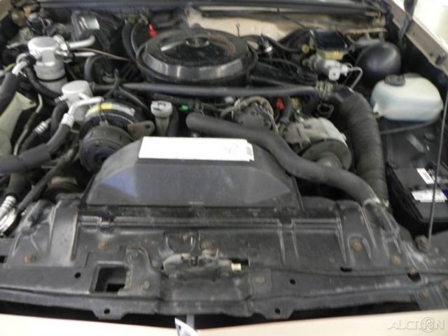 1988 Brown Oldsmobile Cutlass Coupe