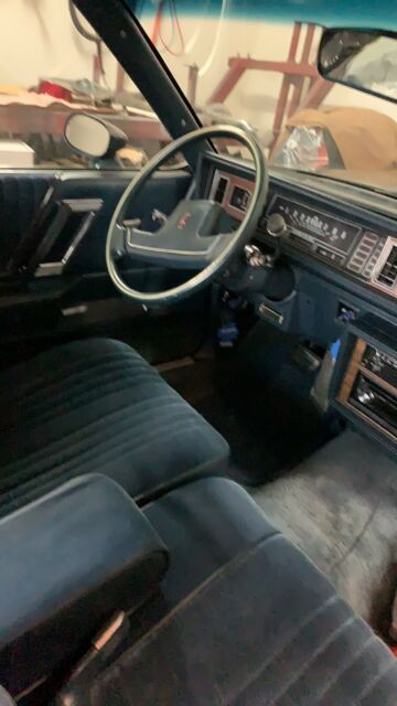 1988 blue Oldsmobile Cutlass Coupe
