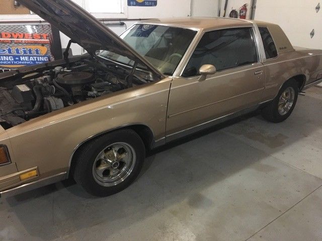 1988 Gold Oldsmobile Cutlass Coupe