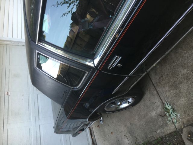 1988 Black  Oldsmobile Cutlass 2 door 