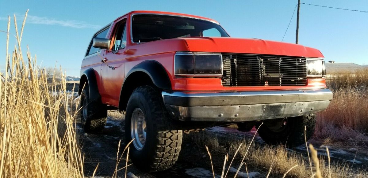 1988 Orange Ford Bronco SUV