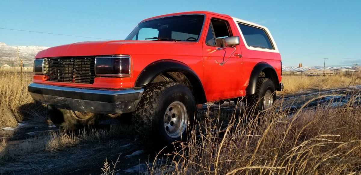 1988 Orange Ford Bronco SUV