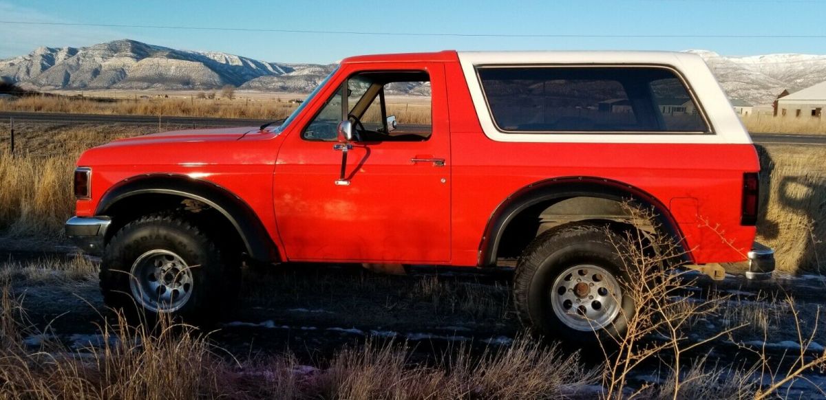 1988 Orange Ford Bronco SUV