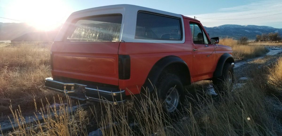 1988 Orange Ford Bronco SUV