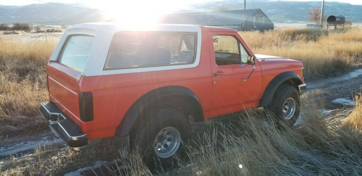 1988 Orange Ford Bronco SUV