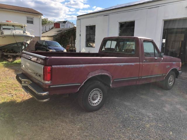 1988 Red Ford F-150 Standard Cab Pickup