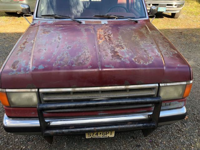 1988 Red Ford F-150 Standard Cab Pickup