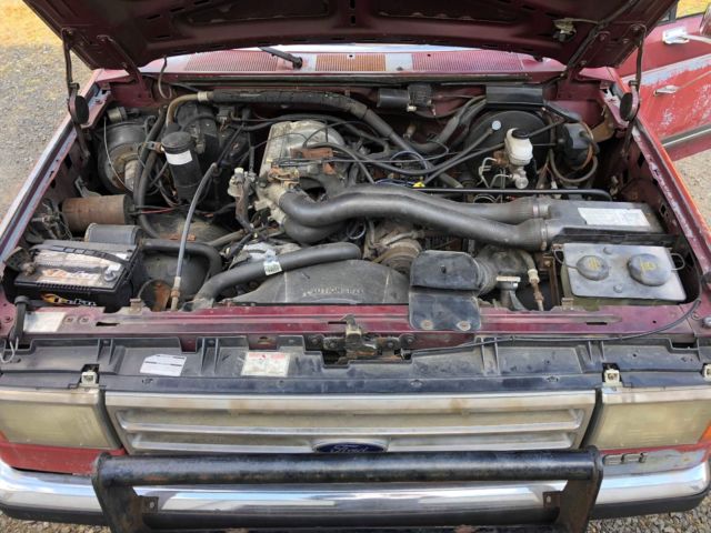 1988 Red Ford F-150 Standard Cab Pickup