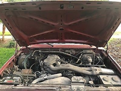 1988 Red Ford F-150 Standard Cab Pickup