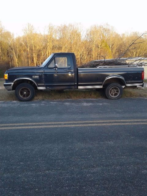 1988 Blue Ford F-150 Extended Cab Pickup