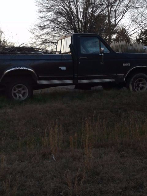 1988 Blue Ford F-150 Extended Cab Pickup