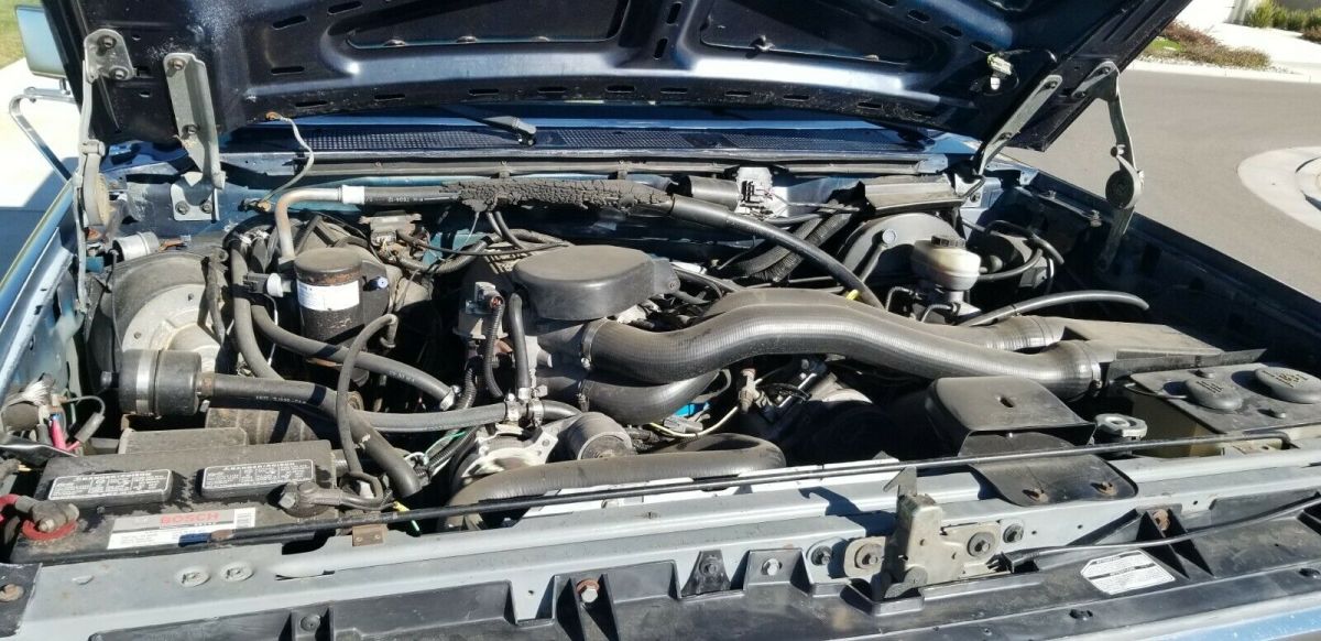 1988 Blue and Tan Ford F-250 Reg Cab Long Bed