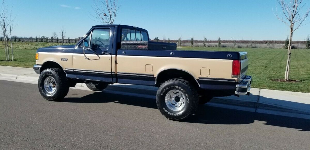 1988 Blue and Tan Ford F-250 Reg Cab Long Bed