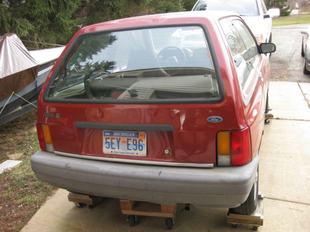 1988 Red Ford Festiva Hatchback