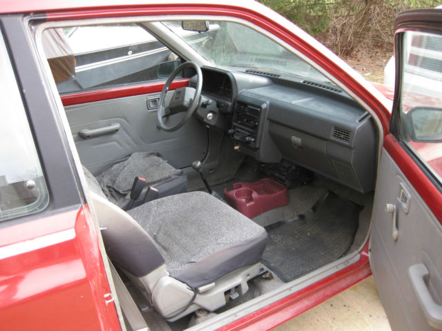 1988 Red Ford Festiva Hatchback