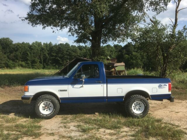 1988 Blue Ford F-150 Extended Cab Pickup