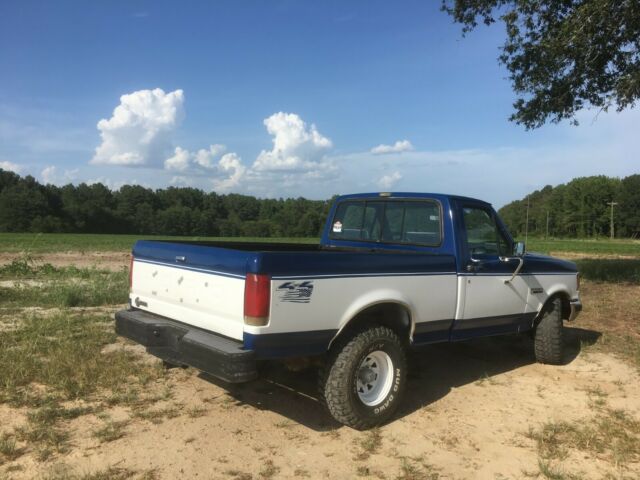 1988 Blue Ford F-150 Extended Cab Pickup