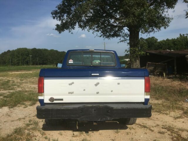 1988 Blue Ford F-150 Extended Cab Pickup