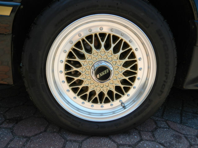 1988 Burgundy Ford Mustang Convertible