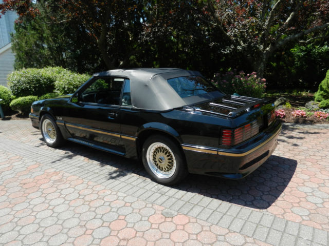 1988 Burgundy Ford Mustang Convertible
