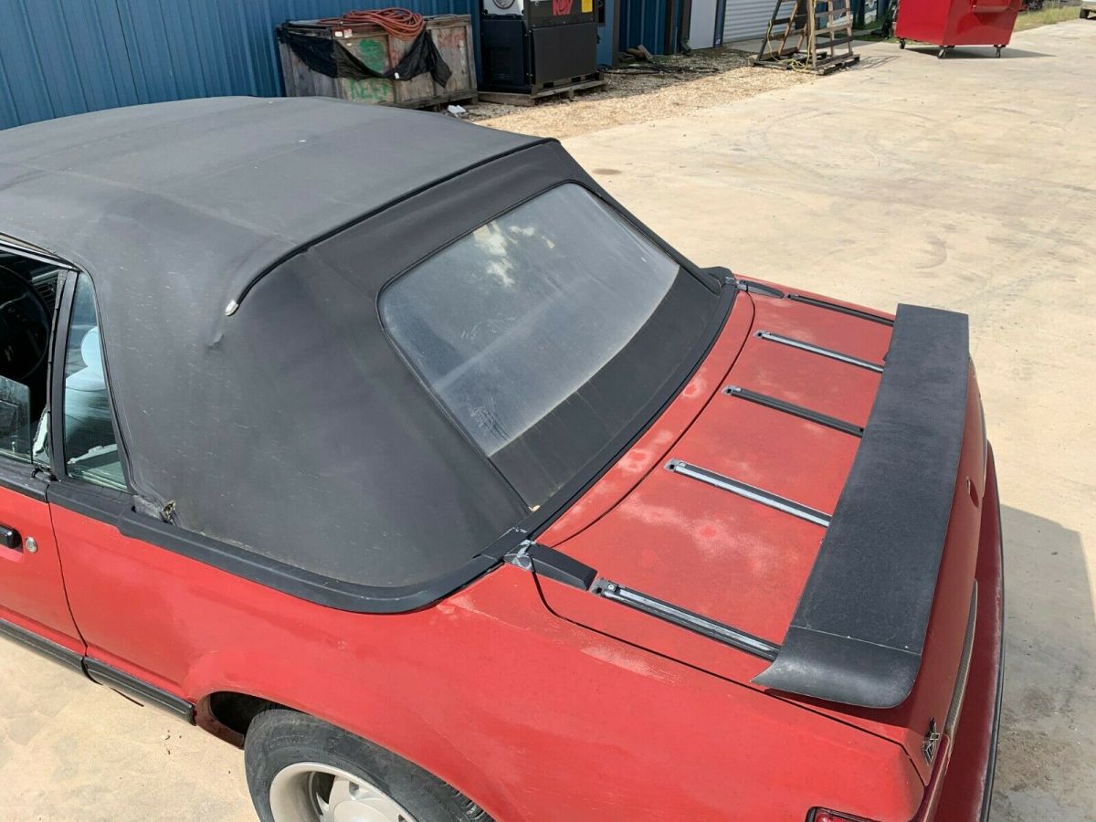 1988 red Ford Mustang Convertible