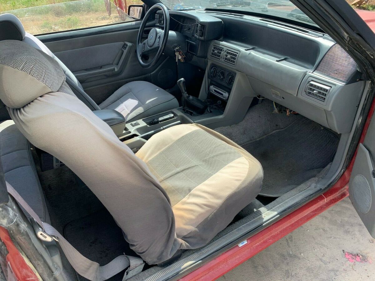 1988 red Ford Mustang Convertible