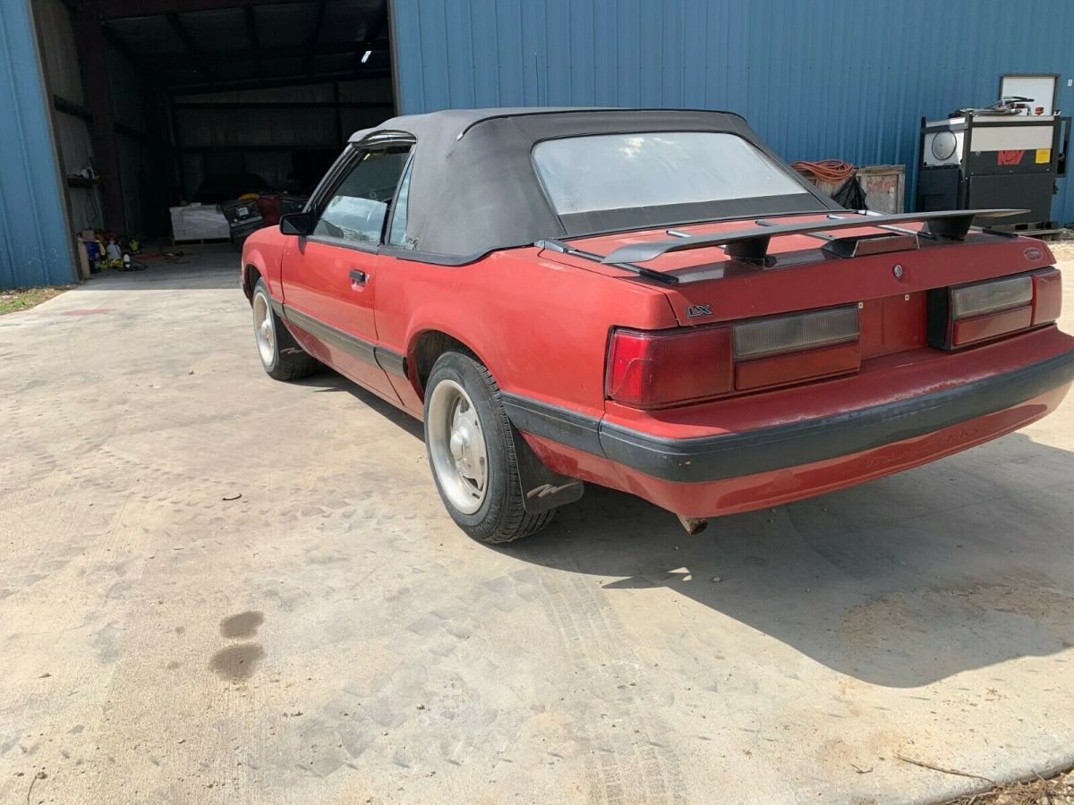 1988 red Ford Mustang Convertible