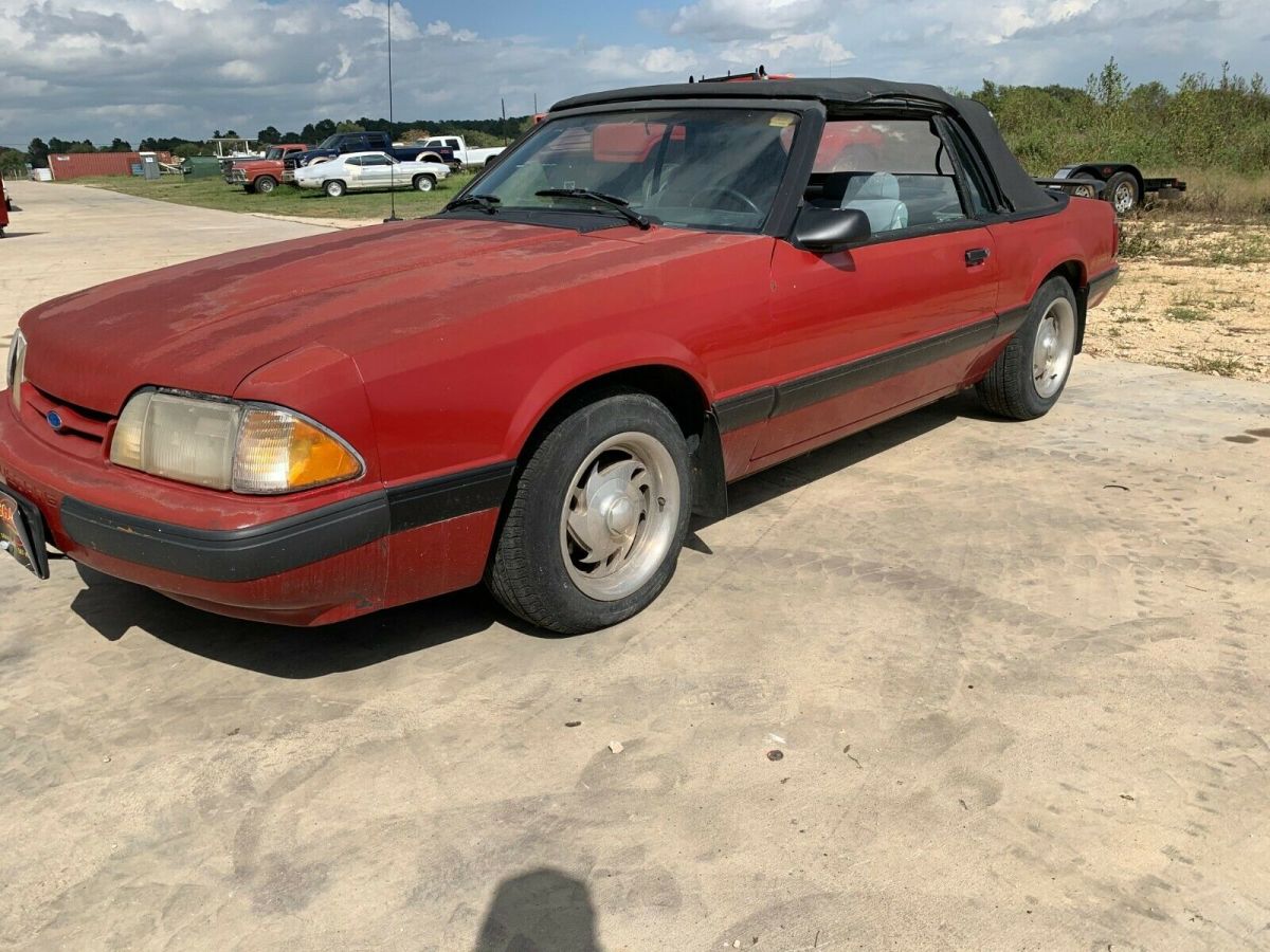 1988 red Ford Mustang Convertible