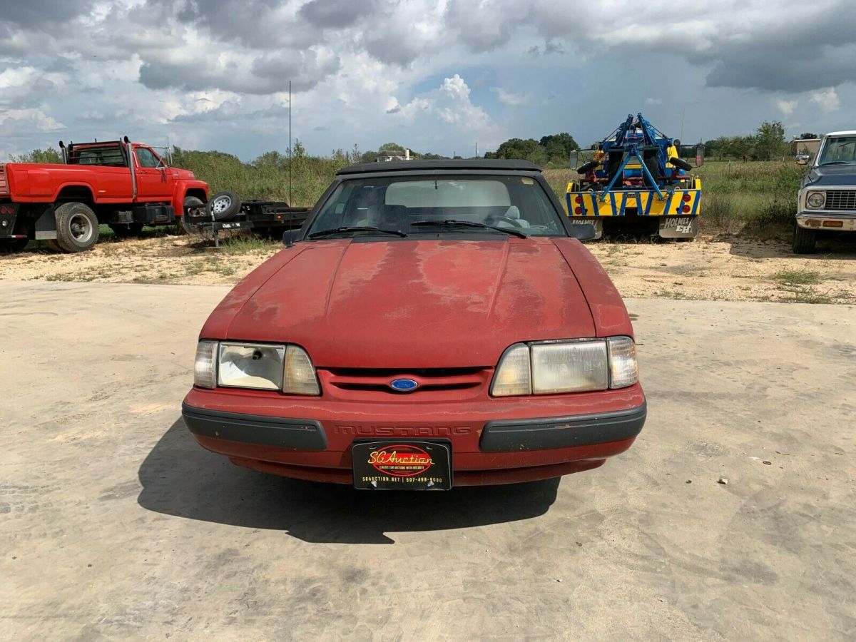 1988 red Ford Mustang Convertible