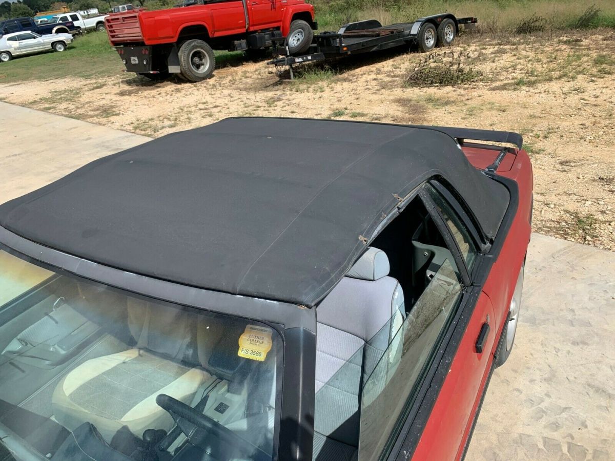 1988 red Ford Mustang Convertible
