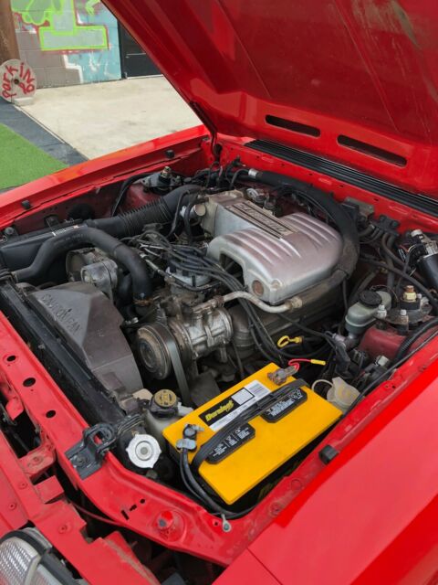 1988 Red Ford Mustang Convertible