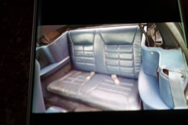 1988 blue mettal Ford Mustang Convertible