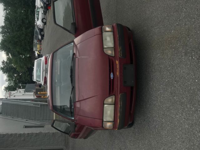 1988 Red Ford Mustang Hatchback
