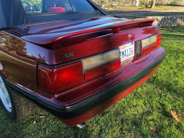 1988 Burgundy Ford Mustang Convertible