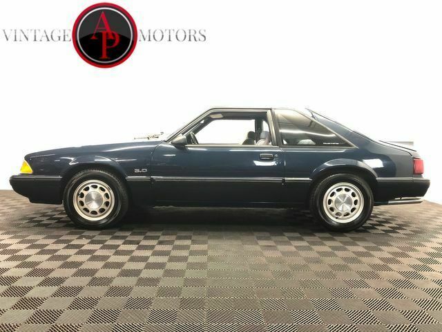 1988 Blue Ford Mustang --