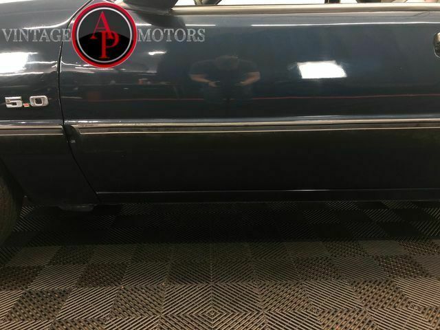 1988 Blue Ford Mustang --