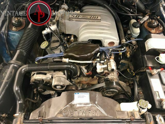 1988 Blue Ford Mustang --