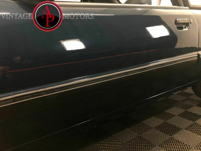 1988 Blue Ford Mustang --