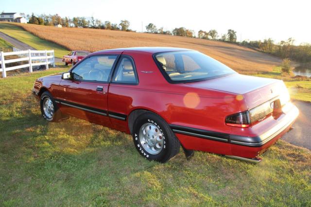 1988 Red Ford Thunderbird Coupe
