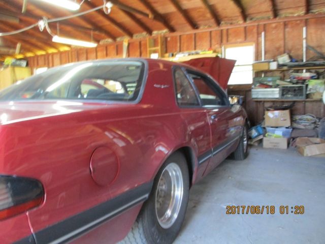 1988 burgandy Ford Thunderbird Turbo Coupe