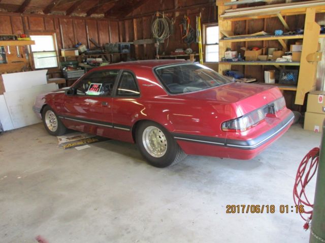 1988 burgandy Ford Thunderbird Turbo Coupe