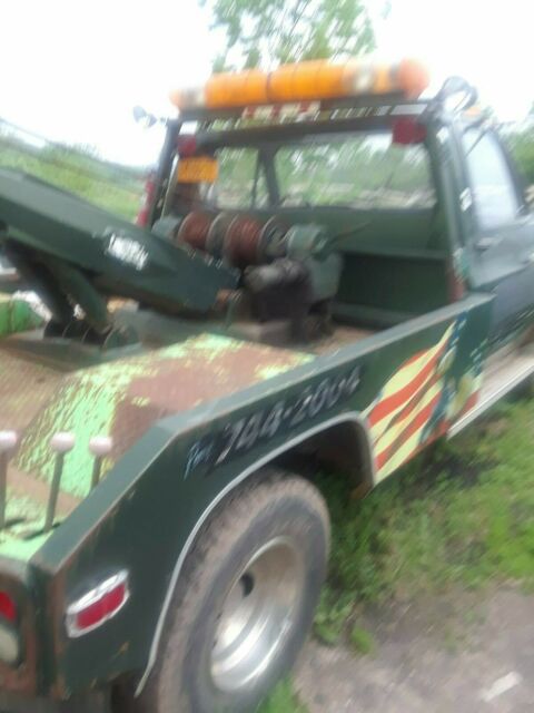 1988 Gray GMC Sierra 3500 tow truck