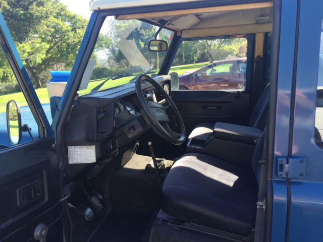1988 Red Land Rover Defender SUV