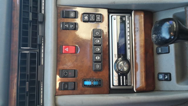 1988 blue Mercedes-Benz 500-Series Sedan